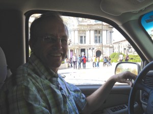 Chris driving in our commute past Bellas Artes!